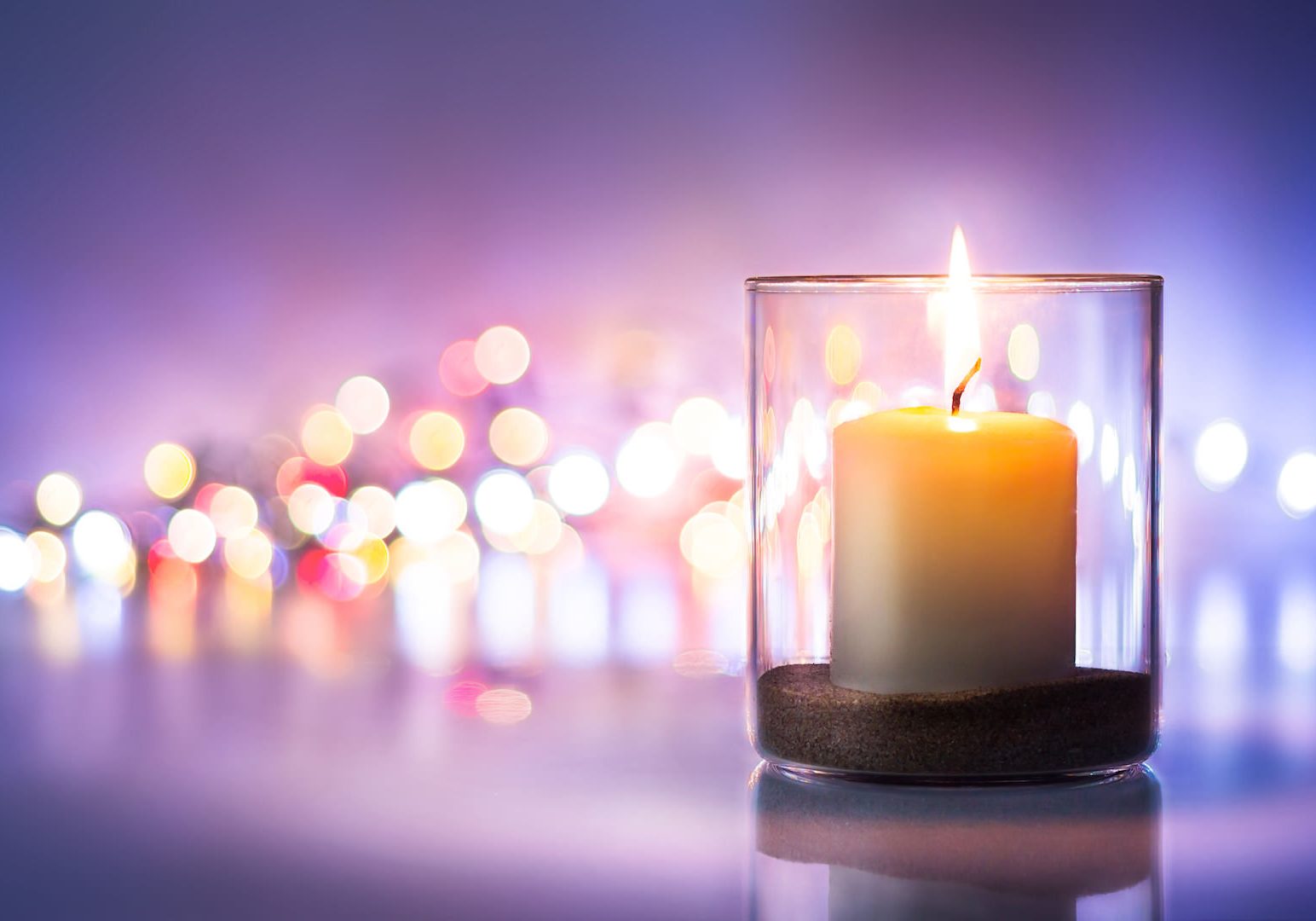 Romantic night with candlelight and bokeh background.New year or romantic valentine Day