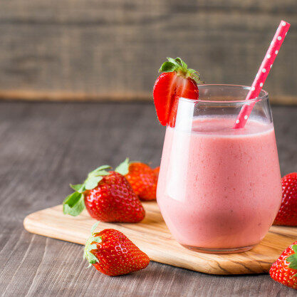 glass-fresh-strawberry-milkshake-smoothie-fresh-strawberries-pink-white-wooden-background-healthy-food-drink-concept_107989-545